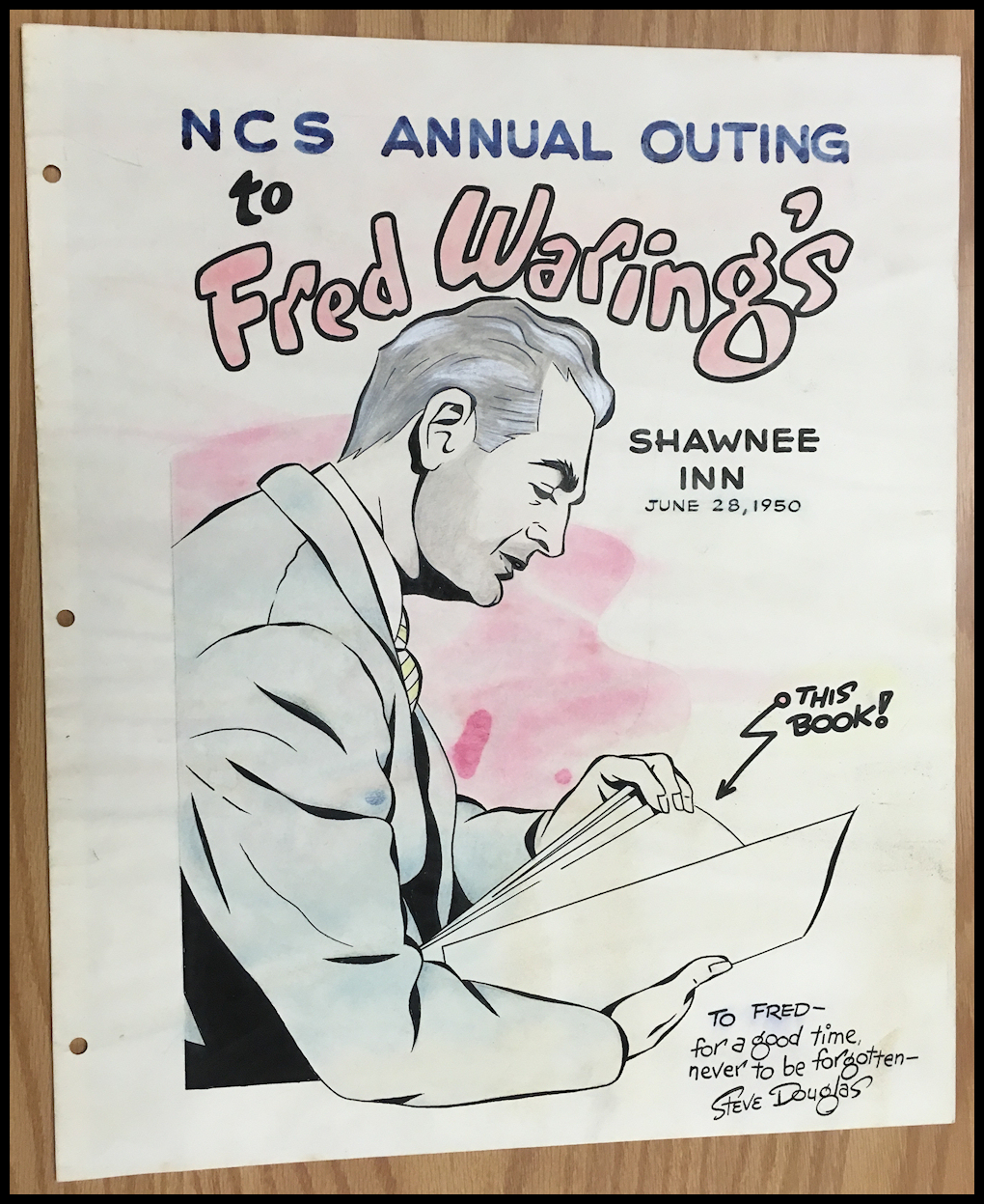 watercolor of Fred looking
            through a big notebook