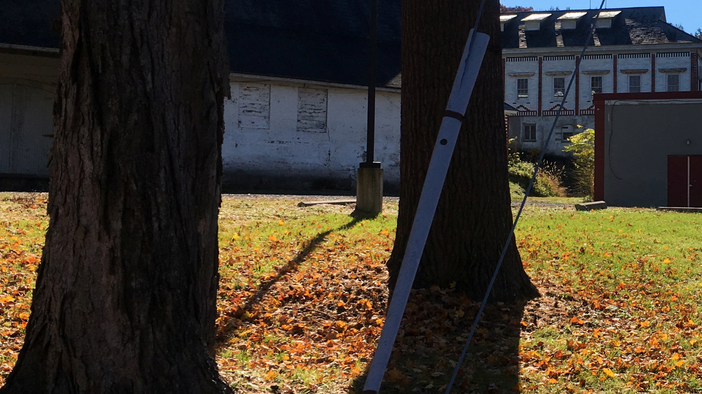 ugly back side of old Castle Inn, showing cables and
              outbuildings